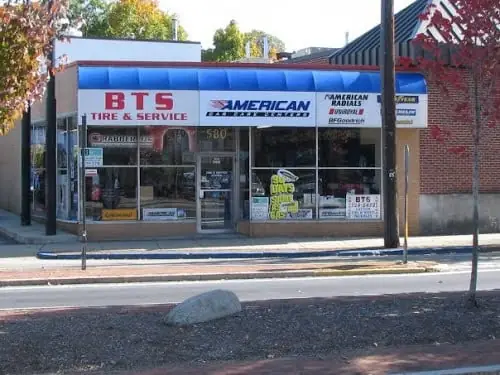 An earlier BTS Tire and Service shopfront on Pawtucket Avenue, with an older awning color and signage
